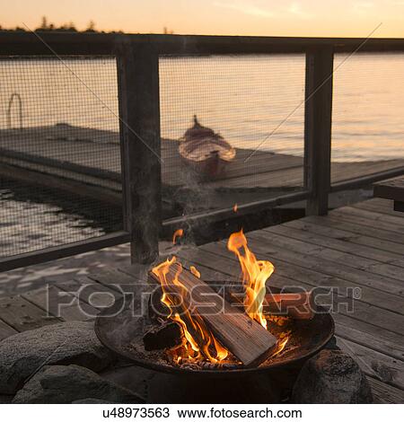 Campfire on dock, Lake of The Woods, Ontario, Canada View Large Photo Image Stock Image - Campfire on dock, Lake of The Woods, Ontario, Canada. Fotosearch