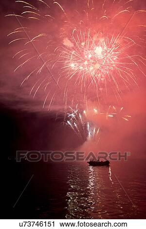Stock Image - Canada Day firework display, Unorganized Kenora, Kenora, Lake of The Woods, Ontario, Canada. Fotosearch