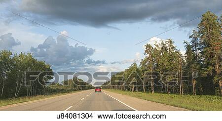 Car moving on the road, Hadashville, Manitoba, Canada View Large Photo Image Picture - Car moving on the road, Hadashville, Manitoba, Canada. Fotosearch
