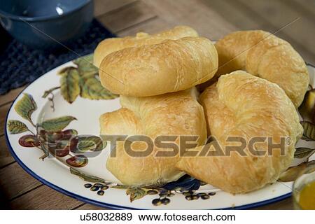 Close-up of croissants on a plate, Lake of The Woods, Ontario, Canada View Large Photo Image Stock Photo - Close-up of croissants on a plate, Lake of The Woods, Ontario, Canada. Fotosearch