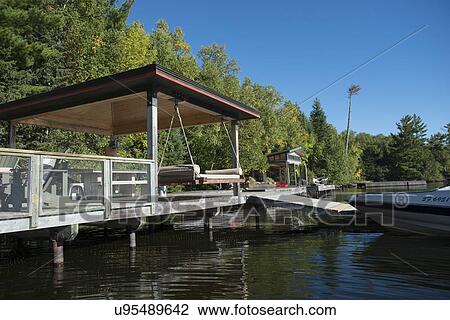 Dock at the lakeside, Lake of The Woods, Ontario, Canada View Large Photo Image Stock Image - Dock at the lakeside, Lake of The Woods, Ontario, Canada. Fotosearch