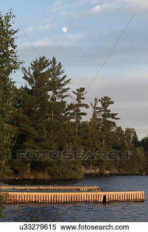 Dock at the lakeside, Lake of The Woods, Ontario, Canada View Large Photo Image Stock Photography - Dock at the lakeside, Lake of The Woods, Ontario, Canada. Fotosearch