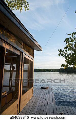 Dock at the lakeside, Lake of The Woods, Ontario, Canada View Large Photo Image Stock Photography - Dock at the lakeside, Lake of The Woods, Ontario, Canada. Fotosearch
