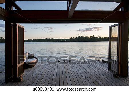 Dock over the lake, Lake of The Woods, Ontario, Canada View Large Photo Image Stock Photography - Dock over the lake, Lake of The Woods, Ontario, Canada. Fotosearch