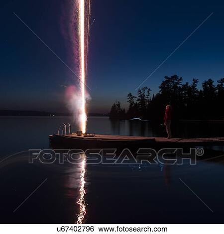 Fireworks on dock, Lake of The Woods, Ontario, Canada View Large Photo Image Stock Photograph - Fireworks on dock, Lake of The Woods, Ontario, Canada. Fotosearch