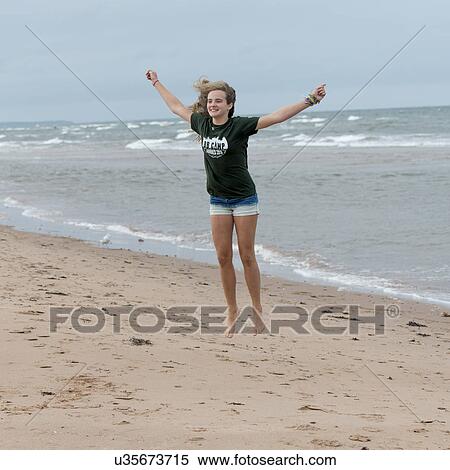 Girl having fun on the beach, York Point, Prince Edward Island, Canada View Large Photo Image Stock Photography - Girl having fun on the beach, York Point, Prince Edward Island, Canada. Fotosearch