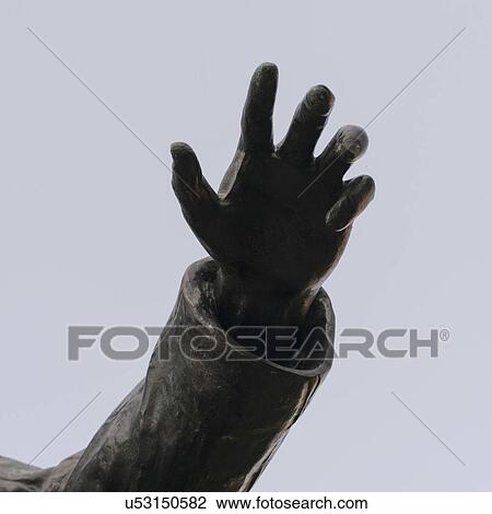 Stock Image - Hand of statue in Queens Square, Charlottetown, Prince Edward Island, Canada. Fotosearch
