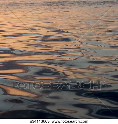 Stock Image - Lake at dusk, Lake of The Woods, Ontario, Canada. Fotosearch