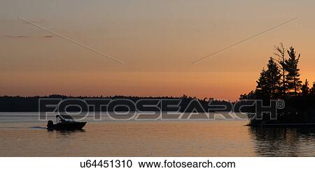 Lake at sunset, Lake of The Woods, Ontario, Canada View Large Photo Image Stock Image - Lake at sunset, Lake of The Woods, Ontario, Canada. Fotosearch