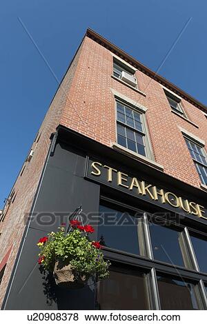 Stock Photo - Low angle view of a steakhouse sign, Queens Square, Charlottetown, Prince Edward Island, Canada. Fotosearch