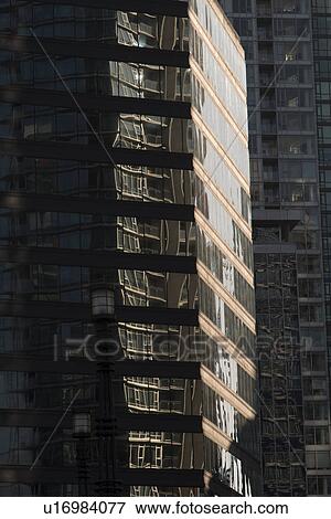 Stock Photo - Modern glass buildings in downtown, Vancouver, British Columbia, Canada. Fotosearch