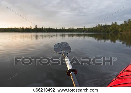 Oar extended over the water, Lake of The Woods, Ontario, Canada View Large Photo Image Stock Image - Oar extended over the water, Lake of The Woods, Ontario, Canada. Fotosearch