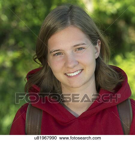Stock Image - Portrait of a woman smiling, Lake of The Woods, Ontario, Canada. Fotosearch