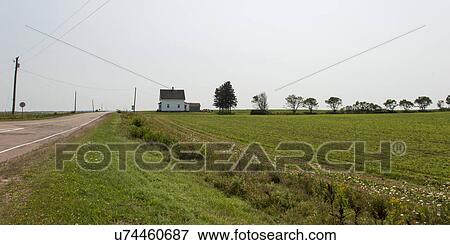 Road passing through a farm, Central Bedeque, Prince Edward Island, Canada View Large Photo Image Stock Photo - Road passing through a farm, Central Bedeque, Prince Edward Island, Canada. Fotosearch