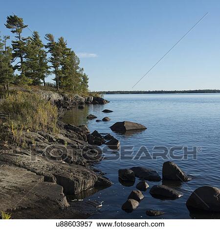 Stock Photo - Rocks on the coast, Lake of The Woods, Ontario, Canada. Fotosearch