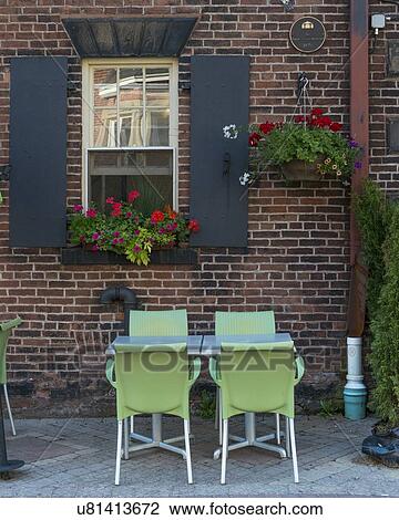 Stock Image - Sidewalk cafe in front of a building, Queens Square, Charlottetown, Prince Edward Island, Canada. Fotosearch