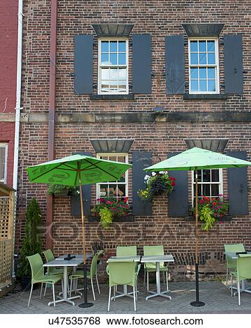 Sidewalk cafe in front of a building, Charlottetown, Prince Edward Island, Canada View Large Photo Image Stock Photo - Sidewalk cafe in front of a building, Charlottetown, Prince Edward Island, Canada. Fotosearch
