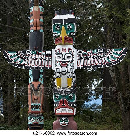 Stock Image - Totem poles at Stanley Park, Vancouver, British Columbia, Canada. Fotosearch