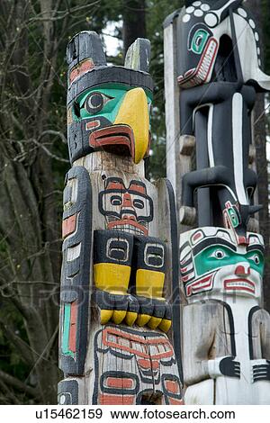 Stock Photo - Totem poles at Stanley Park, Vancouver, British Columbia, Canada. Fotosearch