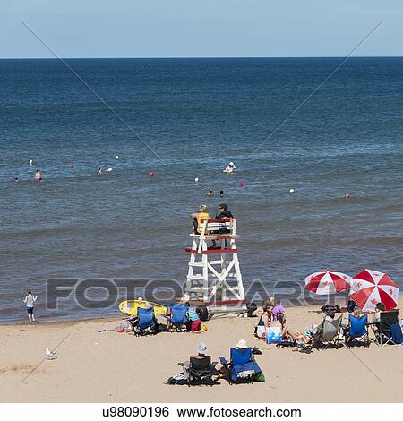 Tourists on the beach, Cavendish Beach, Green Gables, Prince Edward Island, Canada View Large Photo Image Stock Photograph - Tourists on the beach, Cavendish Beach, Green Gables, Prince Edward Island, Canada. Fotosearch