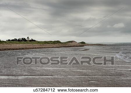Stock Image - View of a beach coastline, Prince Edward Island, Canada. Fotosearch