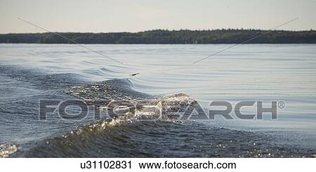 Stock Image - Wave in the Lake, Kenora, Lake of The Woods, Ontario, Canada. Fotosearch