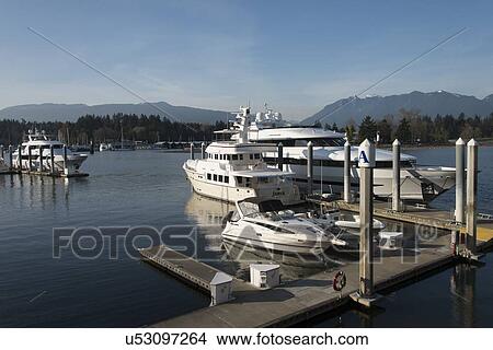 Picture - Yacht at dock, Coal Harbour, Vancouver, British Columbia, Canada. Fotosearch