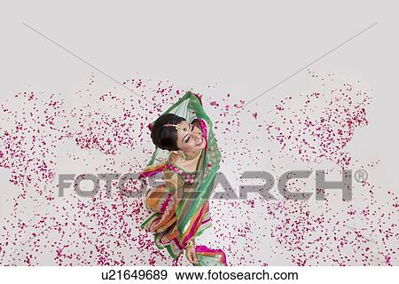 A beautiful bride showered with rose petals View Large Photo Image Stock Photo - A beautiful bride showered with rose petals. Fotosearch