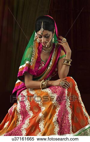 Stock Photography - A beautiful bride sitting. Fotosearch