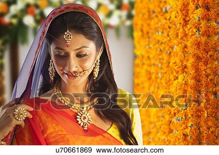Stock Photo - A beautiful bride smiling. Fotosearch