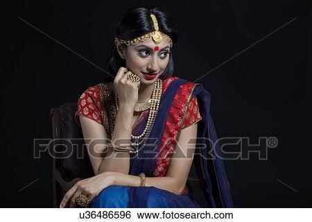 A beautiful bride with jewelery View Large Photo Image Stock Photograph - A beautiful bride with jewelery. Fotosearch