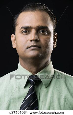 A composed executive View Large Photo Image Picture - A composed executive . Fotosearch