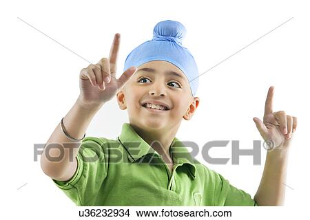 A Sikh boy dancing View Large Photo Image Picture - A Sikh boy dancing . Fotosearch