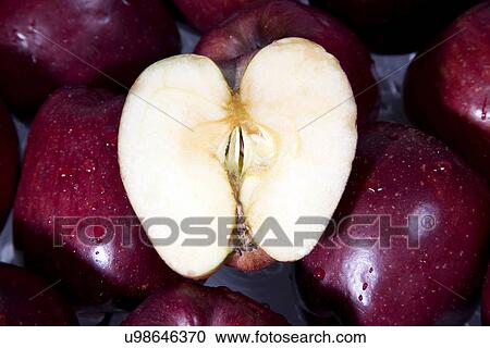 Stock Image - A sliced apple . Fotosearch