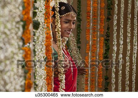 Stock Photography - An attractive bride smiling . Fotosearch