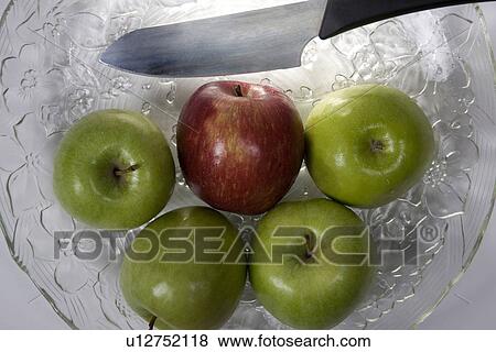 Apples with a knife View Large Photo Image Stock Photo - Apples with a knife . Fotosearch