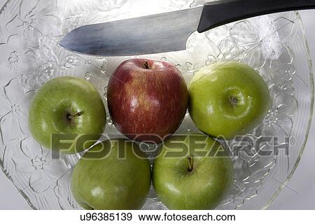 Apples with a knife View Large Photo Image Stock Photo - Apples with a knife . Fotosearch