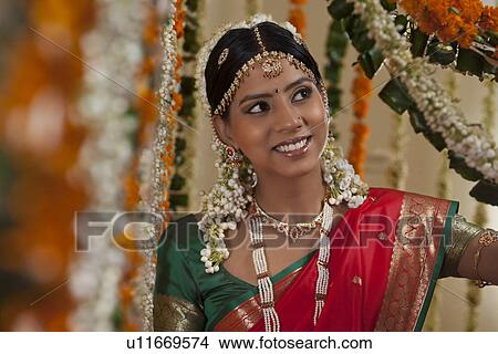 Beautiful Asian bride looking away View Large Photo Image Picture - Beautiful Asian bride looking away . Fotosearch