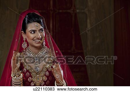 Beautiful bride looking away View Large Photo Image Stock Image - Beautiful bride looking away . Fotosearch