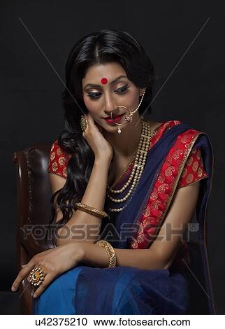 Beautiful bride with jewelery sitting View Large Photo Image Stock Image - Beautiful bride with jewelery sitting. Fotosearch
