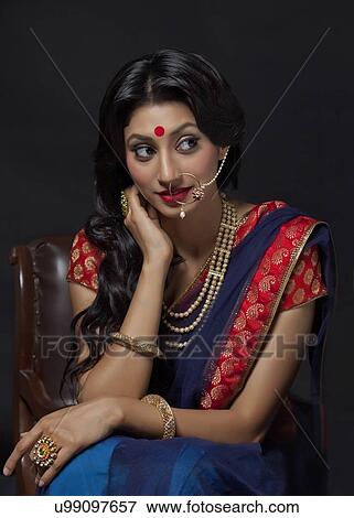 Beautiful bride with jewelery sitting View Large Photo Image Stock Photo - Beautiful bride with jewelery sitting. Fotosearch