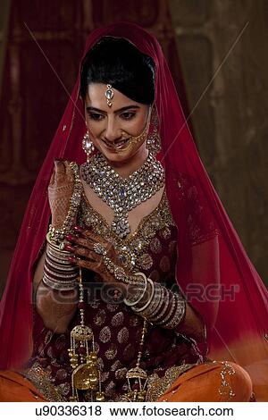 Beautiful young bride smiling View Large Photo Image Stock Photo - Beautiful young bride smiling . Fotosearch