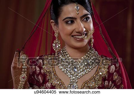 Beautiful young woman in wedding dress View Large Photo Image Stock Photography - Beautiful young woman in wedding dress . Fotosearch