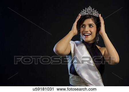 Beauty pageant winner feeling overjoyed View Large Photo Image Stock Image - Beauty pageant winner feeling overjoyed . Fotosearch