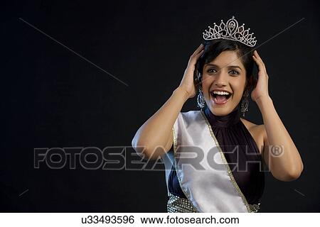 Beauty pageant winner feeling overjoyed View Large Photo Image Stock Photograph - Beauty pageant winner feeling overjoyed . Fotosearch