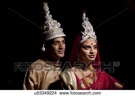 Bengali bride and groom with a topor View Large Photo Image Picture - Bengali bride and groom with a topor . Fotosearch