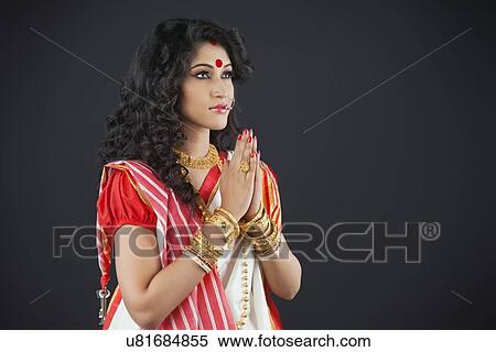 Stock Photography - Bengali woman praying . Fotosearch