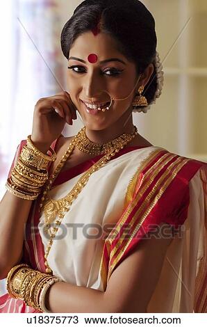 Stock Image - Bengali woman smiling. Fotosearch
