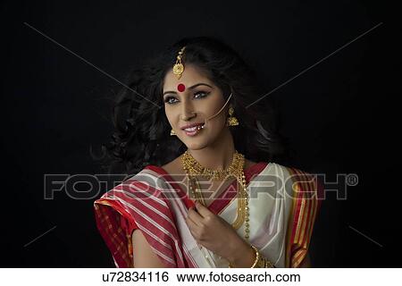 Stock Photograph - Bengali woman smiling . Fotosearch