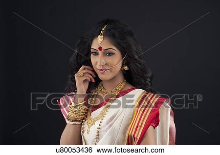 Stock Photograph - Bengali woman smiling. Fotosearch